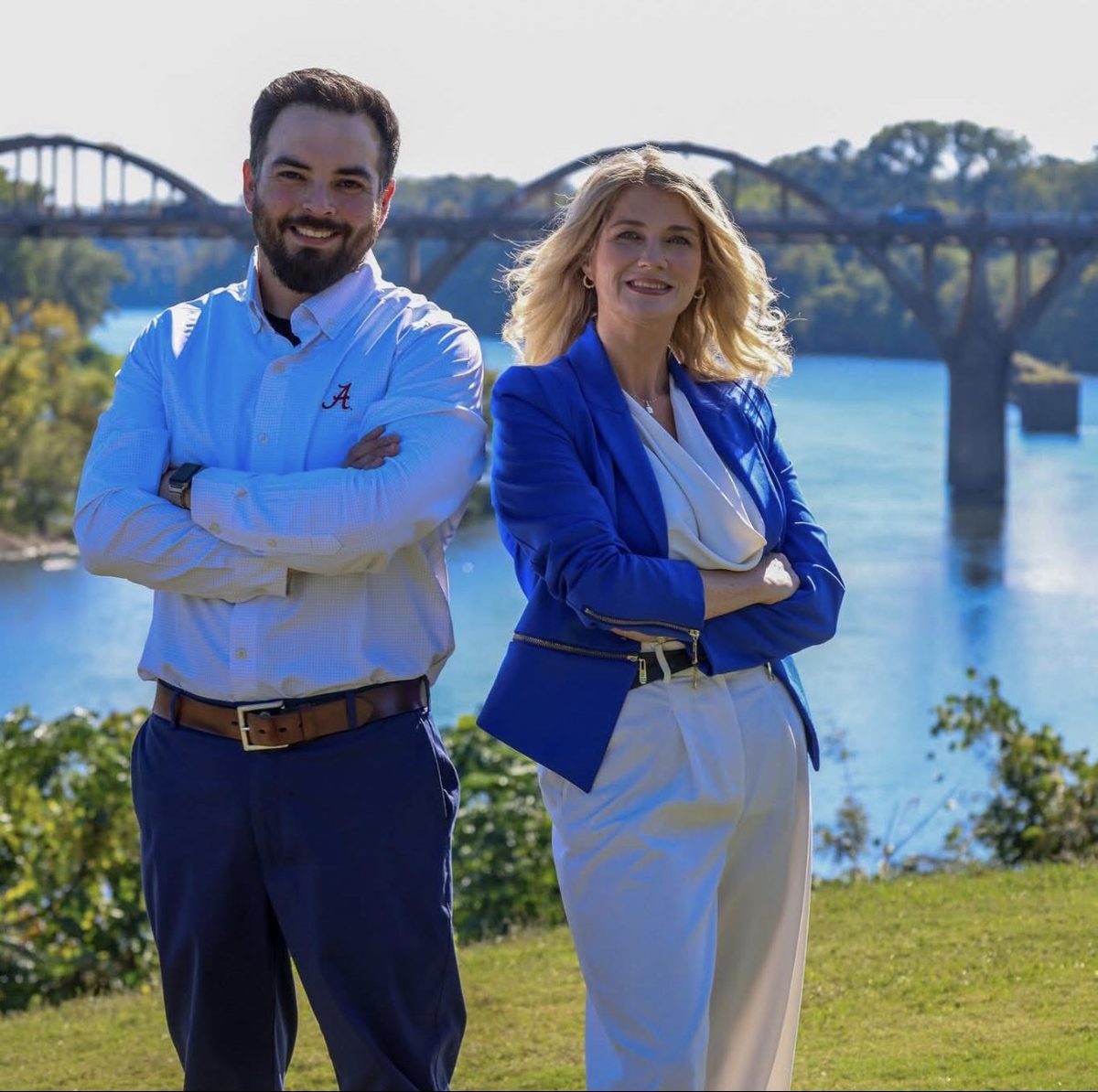 Chris and Courtney Lowry by the Coosa River with the Bibb Graves Bridge behind them